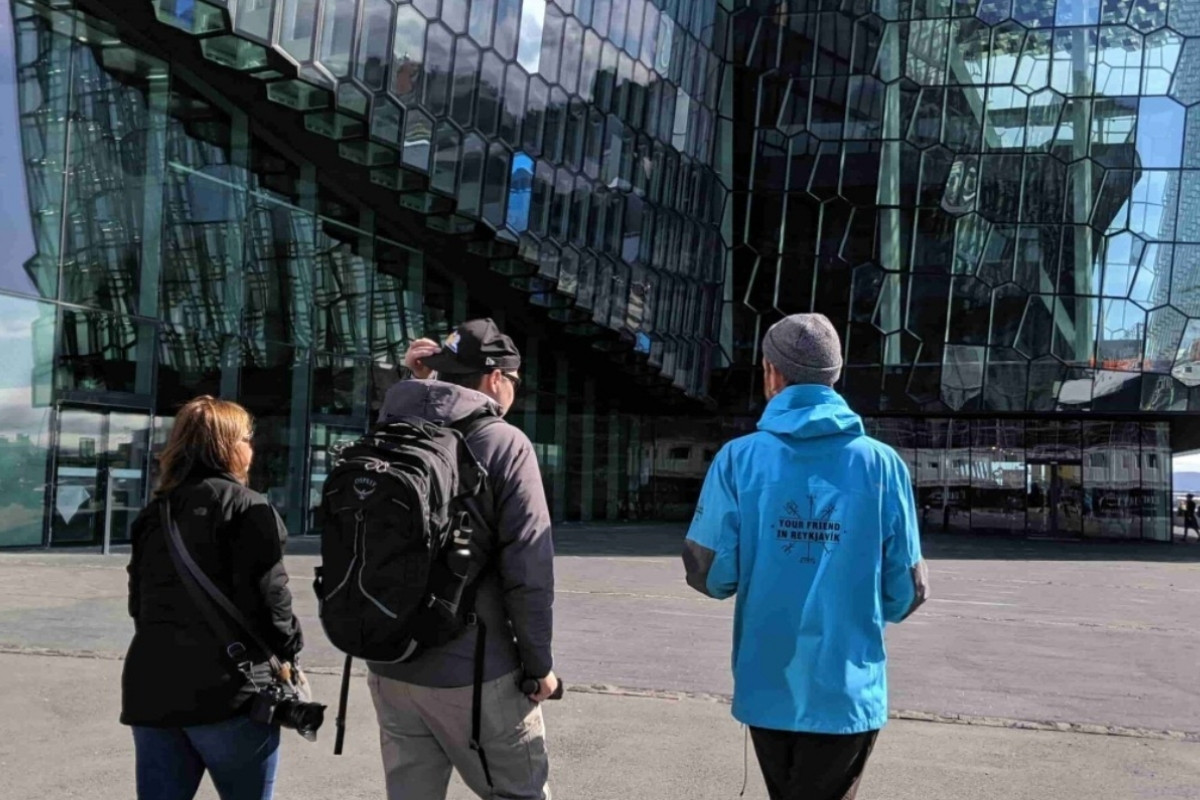 Three people, on a tour with 