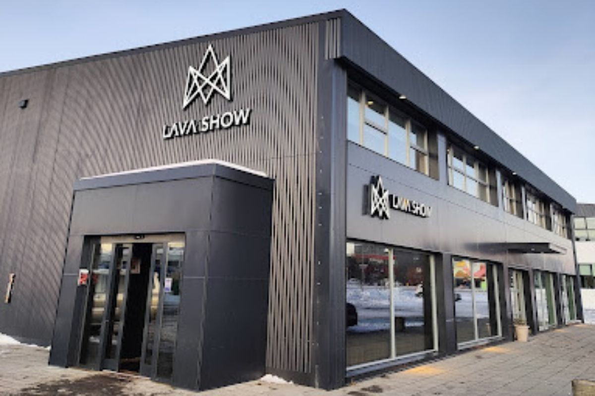 A wide shot of the Lava Show venue, a contemporary building with signage clearly displaying the attraction's name and logo.
