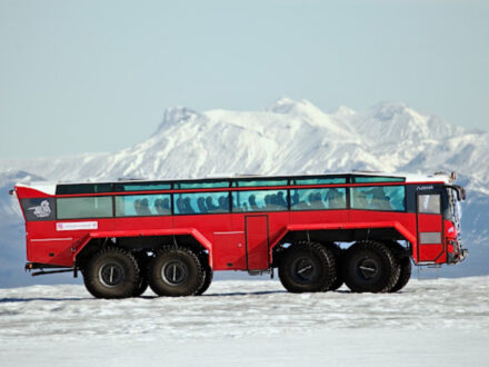 Sleipnir Glacier Tours monster truck on a snowy glacier.