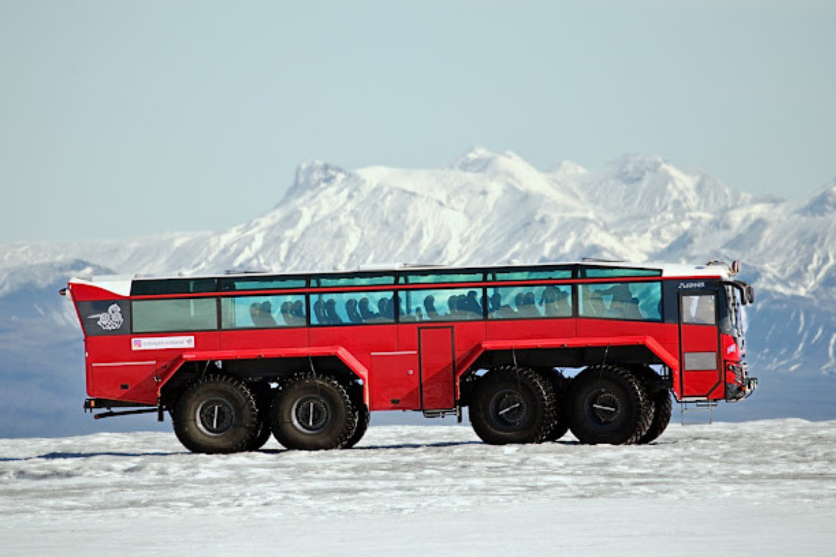 Sleipnir Glacier Tours monster truck on a snowy glacier.